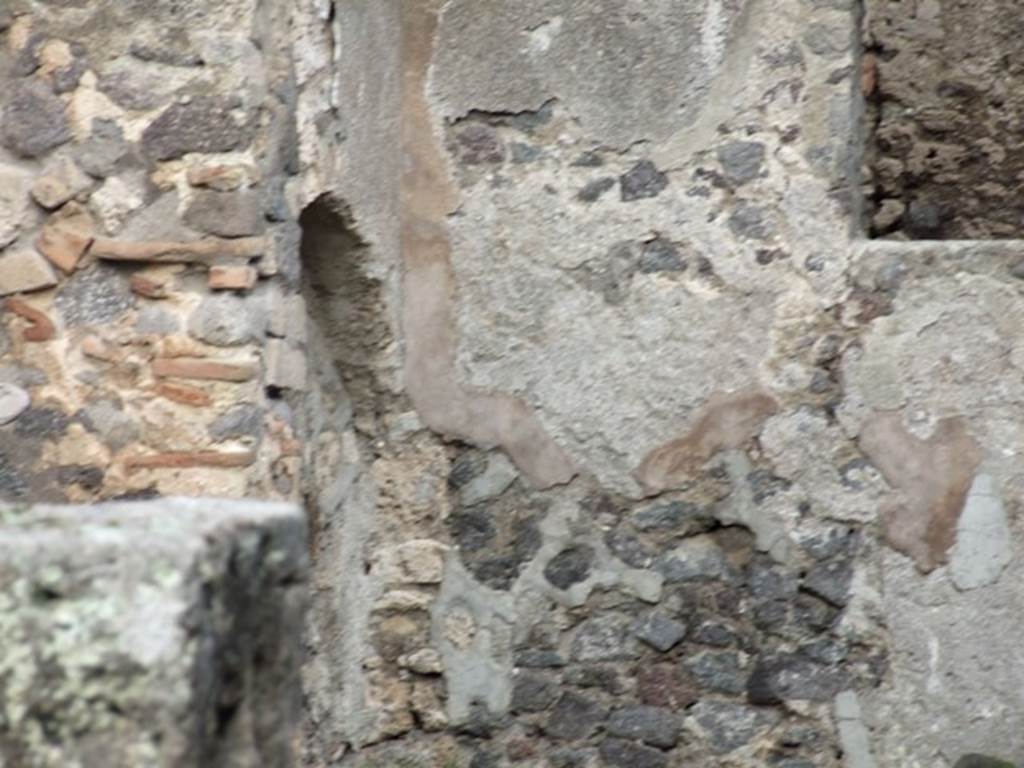 IX.2.4 Pompeii. December 2007. North-east corner of triclinium with arched niche. 