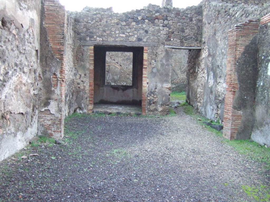 IX.2.5 Pompeii. December 2005.  Looking east from shop towards rear.