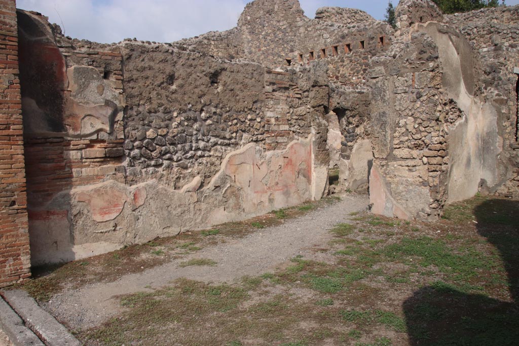 IX.2.7 Pompeii. October 2023. Looking east along north wall of shop-room. Photo courtesy of Klaus Heese.