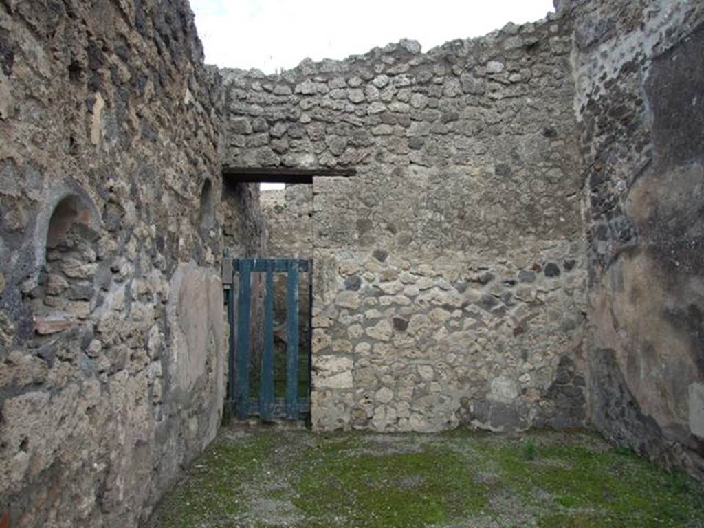 IX.2.11 Pompeii. December 2007. East wall with doorway into rear room.