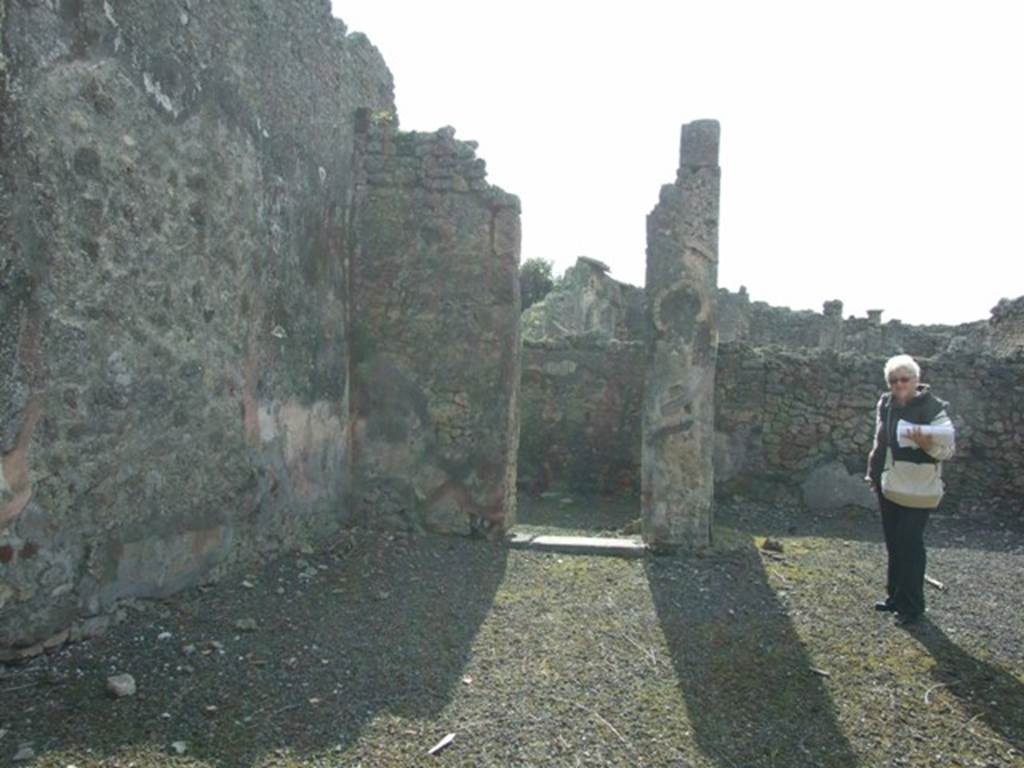 IX.2.17 Pompeii.  March 2009.  Looking west along south side of Room 1, Atrium, towards Doorway to Room 4, Cubiculum.