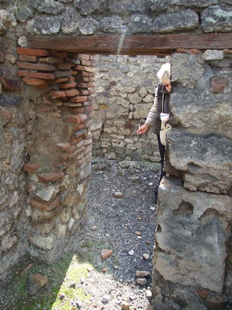 IX.2.18 Pompeii. March 2009.  Doorway to Room 8, Kitchen.