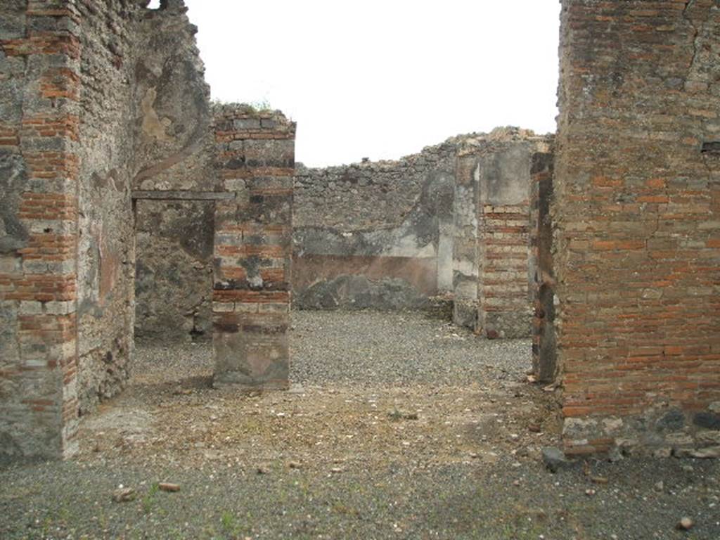 IX.2.21 Pompeii. May 2005. Room 6, tablinum. According to Bragantini, this room would have had a threshold of cocciopesto with decoration delineated with white tesserae. The floor would have been of cocciopesto with successive rows of irregular polychrome marble tiles.
See Bragantini, de Vos, Badoni, 1986. Pitture e Pavimenti di Pompei, Parte 3. Rome: ICCD. (p.423, tablino g)
