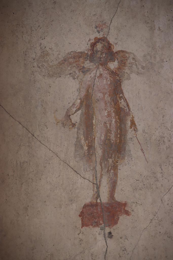 IX.3.5 Pompeii. October 2023. 
Room 4, painted figure in recess in east side of north wall. Photo courtesy of Klaus Heese.
