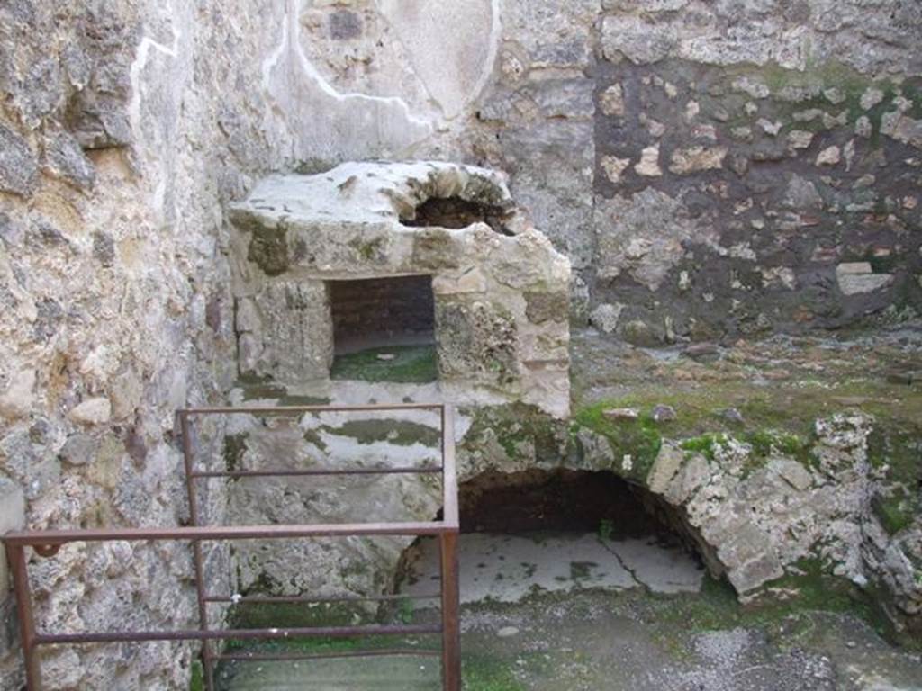 IX.3.5 Pompeii. March 2009. Room 9, oven and hearth or bench in south-west corner of kitchen.