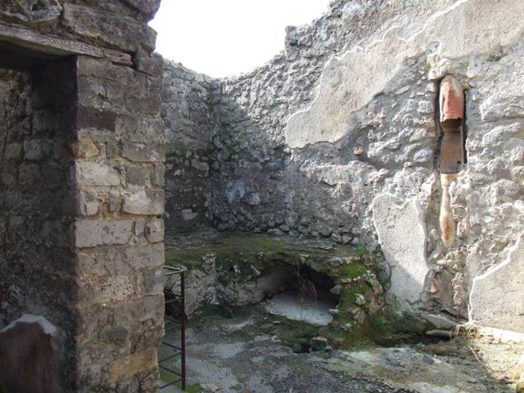 IX.3.5 Pompeii. March 2009. Room 9, kitchen, with bench in north-west corner.