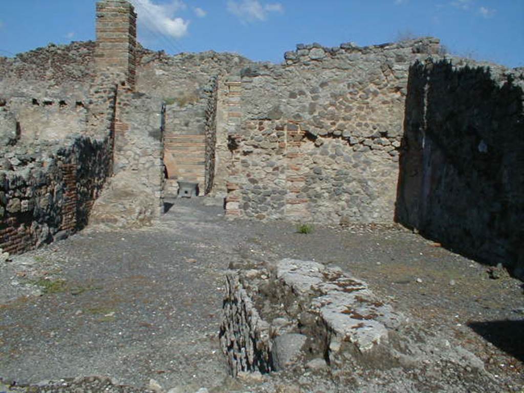 IX.3.10 Pompeii. May 2006. Shop, for bread made at the bakery at the rear of shop