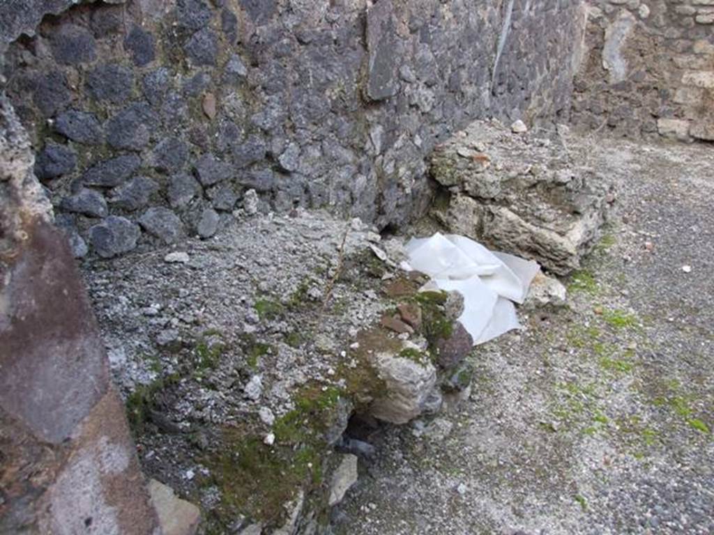 IX.3.13 Pompeii.  March 2009.  Atrium.  Remains of hearth and bench.