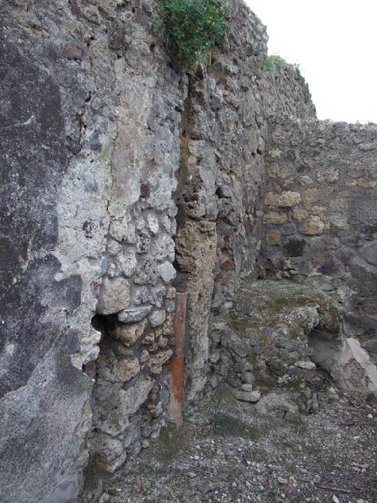 IX.3.15 Pompeii. March 2009. Room 12, kitchen in north-west corner of portico, with latrine.