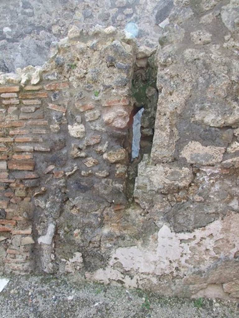 IX.3.16 Pompeii.  March 2009.  West wall of rear room.  Site of downpipe.