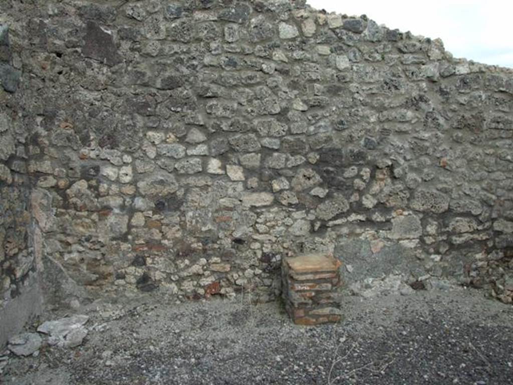 IX.3.17  Pompeii.  March 2009.  Altar on east wall of workshop.