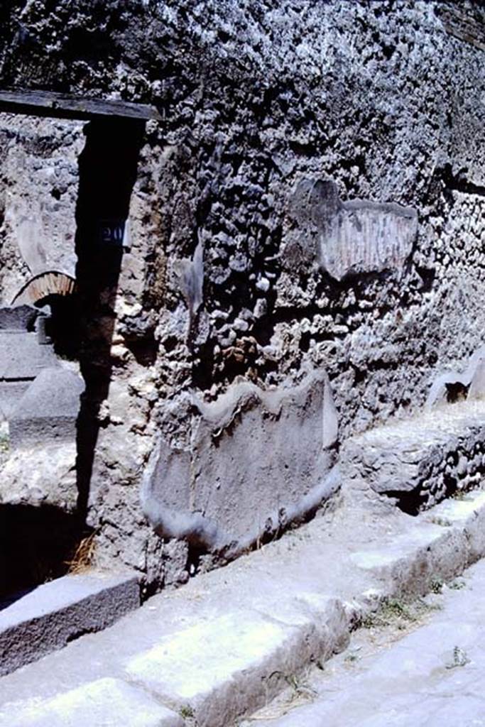 IX.3.20 Pompeii. 1966. Entrance doorway, with seat outside and graffiti painted on wall. 
Photo by Stanley A. Jashemski.
Source: The Wilhelmina and Stanley A. Jashemski archive in the University of Maryland Library, Special Collections (See collection page) and made available under the Creative Commons Attribution-Non Commercial License v.4. See Licence and use details.
J66f0471
