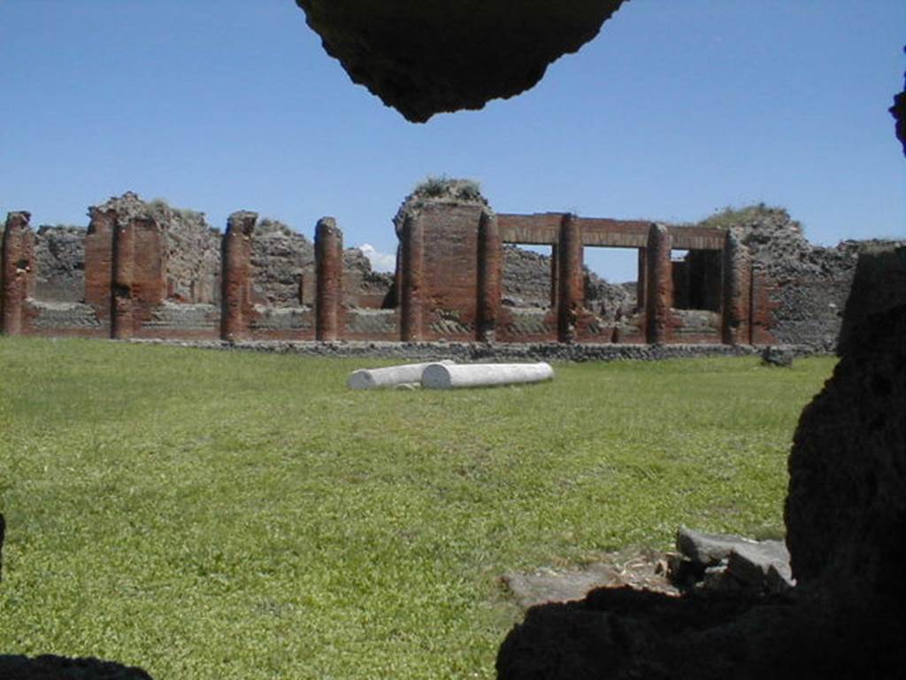 IX.4.6 Pompeii. May 2005. Central Baths through hole in wall at IX.4.6