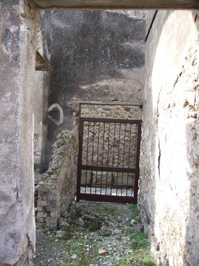 IX.5.2 Pompeii. December 2007. Corridor leading west to rear entrance at IX.5.22 on Vicolo di Tesmo.