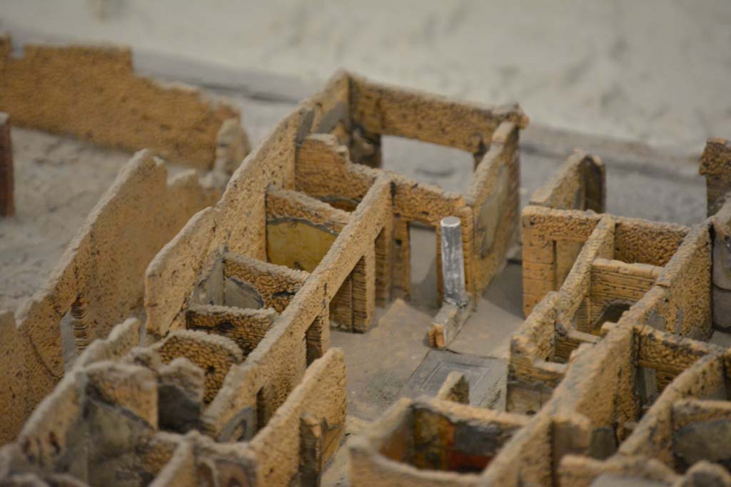 IX.5.1/2/3 Pompeii. July 2017. Looking north-west across atrium towards doorways from shops with entrance corridor, in centre.
From cork model in Naples Archaeological Museum.
Foto Annette Haug, ERC Grant 681269 DÉCOR
