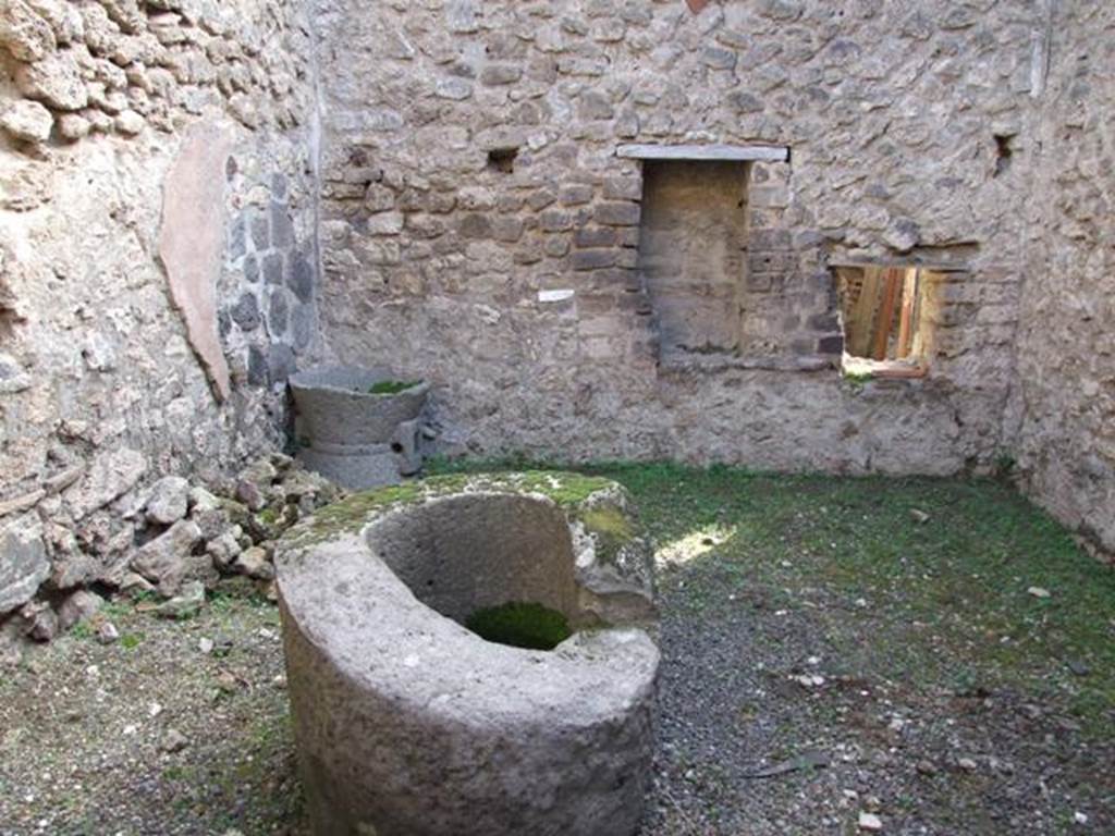 IX.5.4 Pompeii. December 2007. Bakery area, in the centre - the lava pot that Mau thought may have been used for the dough.
