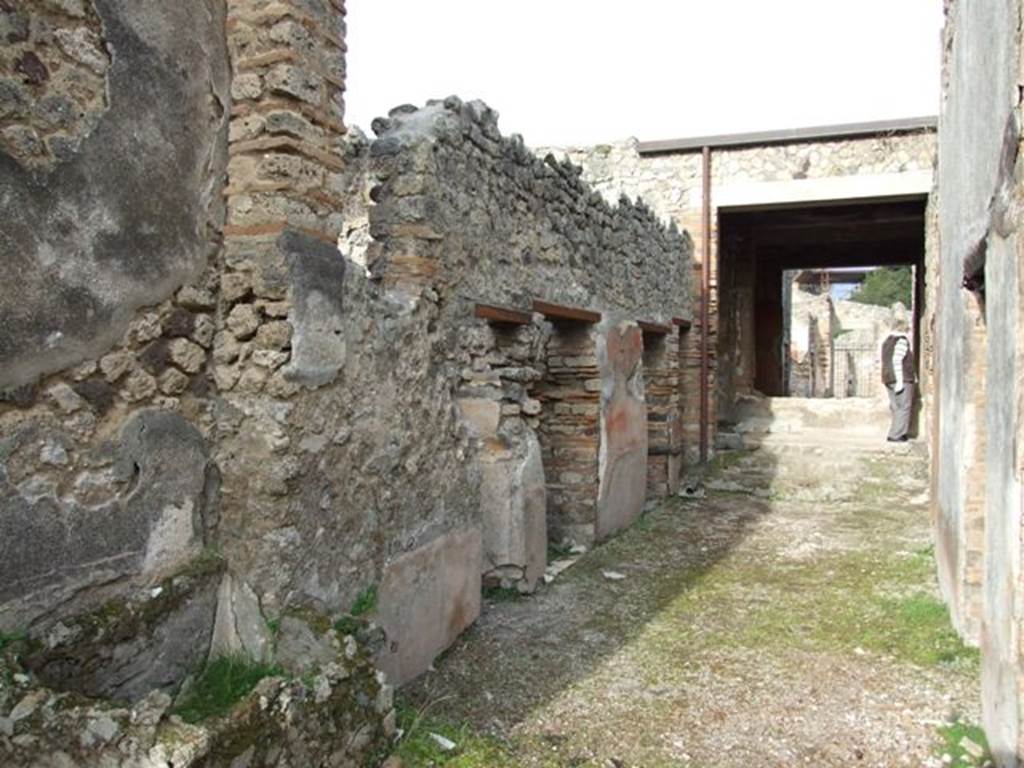 IX.5.6 Pompeii. December 2007. Looking north-west towards west side of room n, with doorways to rooms s, t, r, and v. 

