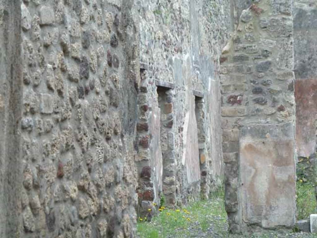 IX.5.9 Pompeii. May 2010. Doorways of rooms m and n, on east side of peristyle.

