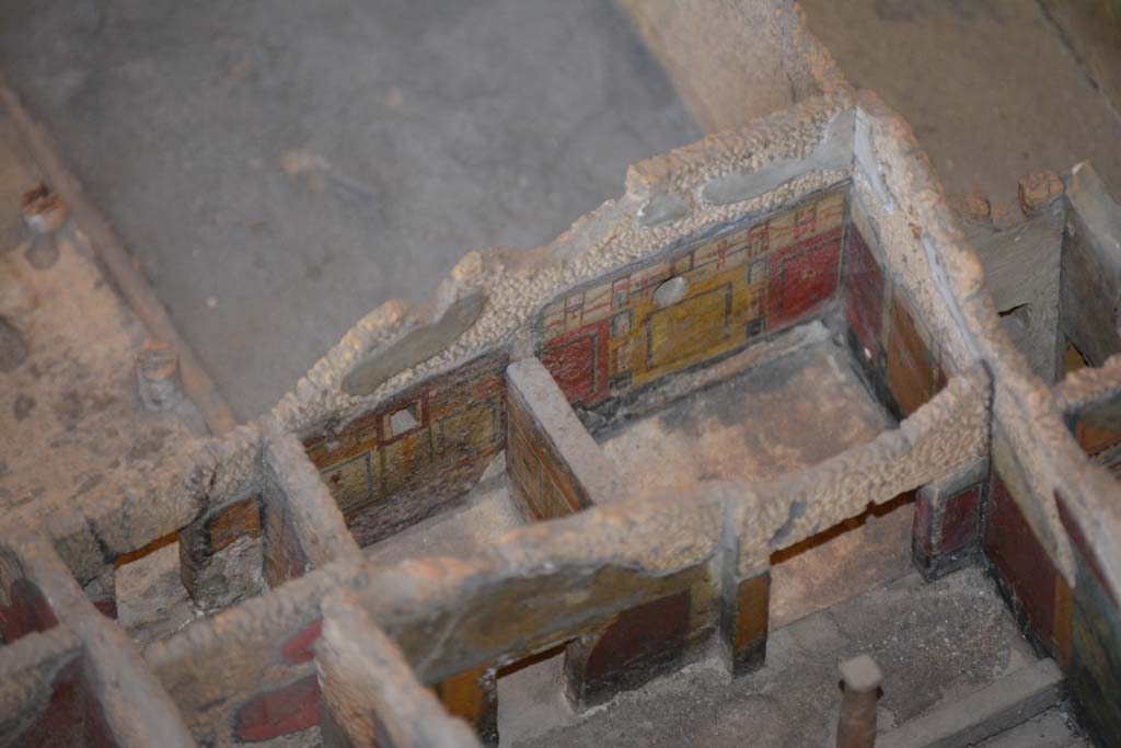 IX.5.9 Pompeii. July 2017. Detail of two rooms with decorated south walls on south side of peristyle garden.
On the left is a room with doorway from the peristyle of IX.5.14
From cork model in Naples Archaeological Museum.
Foto Annette Haug, ERC Grant 681269 DÉCOR
