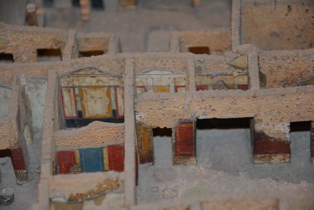 IX.5.11 Pompeii. July 2017. 
Looking west towards south-west corner of atrium, in centre, with tablinum with red and blue walls, on left.  
From cork model in Naples Archaeological Museum.
Foto Annette Haug, ERC Grant 681269 DÉCOR.
