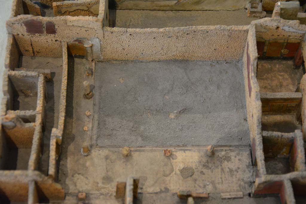 IX.5.14 Pompeii. July 2017. Looking towards west wall of peristyle k, with south and east portico. 
From cork model in Naples Archaeological Museum.
Foto Annette Haug, ERC Grant 681269 DÉCOR
