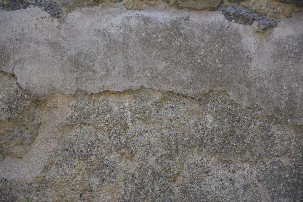 IX.5.17/6 Pompeii. May 2017. Room x, detail of remaining plaster on lower west wall.
Foto Christian Beck, ERC Grant 681269 DCOR.
