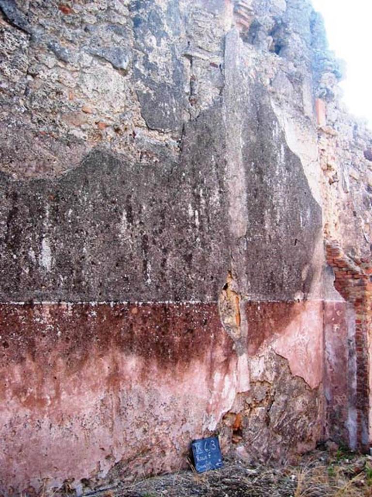 IX.6.3 Pompeii. July 2008. East wall of small garden area, with downpipe. Photo courtesy of Barry Hobson.