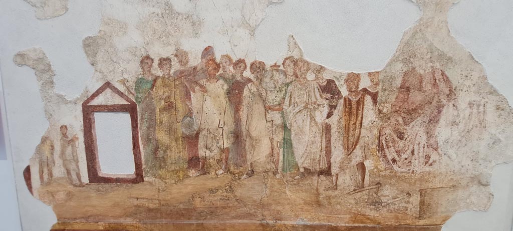 IX.7.1 Pompeii. April 2022. 
Painting on wall in Antiquarium, showing procession in honour of the goddess Cybele. Photo courtesy of Giuseppe Ciaramella.
