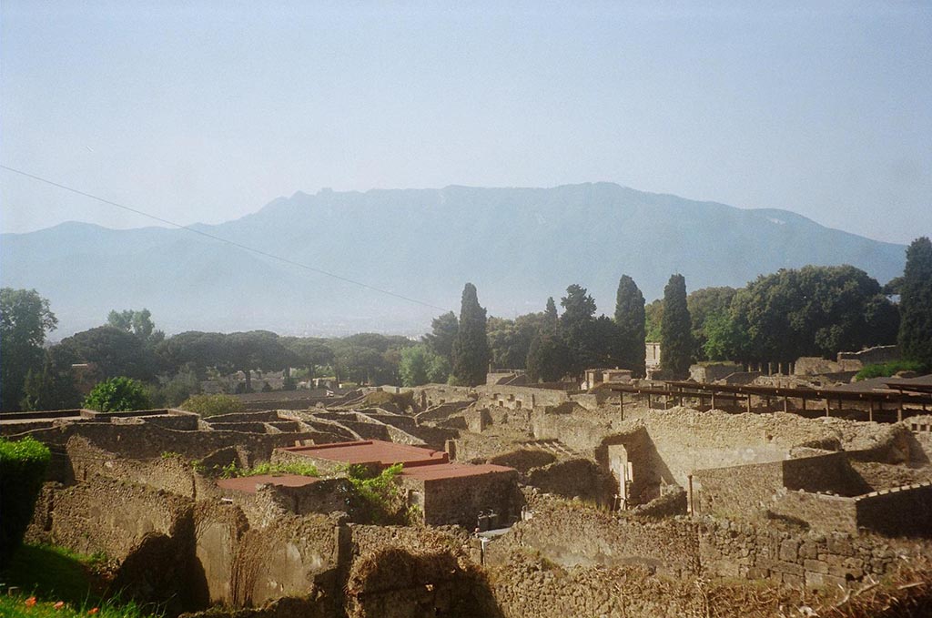 View looking south-west towards the Stabian Gate, taken from above IX.7.12. May 2010. Photo courtesy of Rick Bauer.