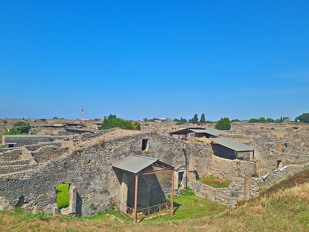 IX.7.20 or IX.7.(?) Pompeii. June 2024. Looking west from rear of Casina dell’Aquila. Photo courtesy of Giuseppe Ciaramella.