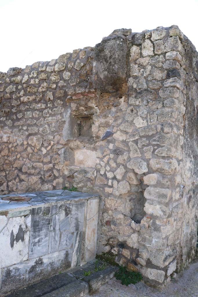 IX.7.24 Pompeii. December 2018. 
Looking towards west wall at end of counter. Photo courtesy of Aude Durand.
