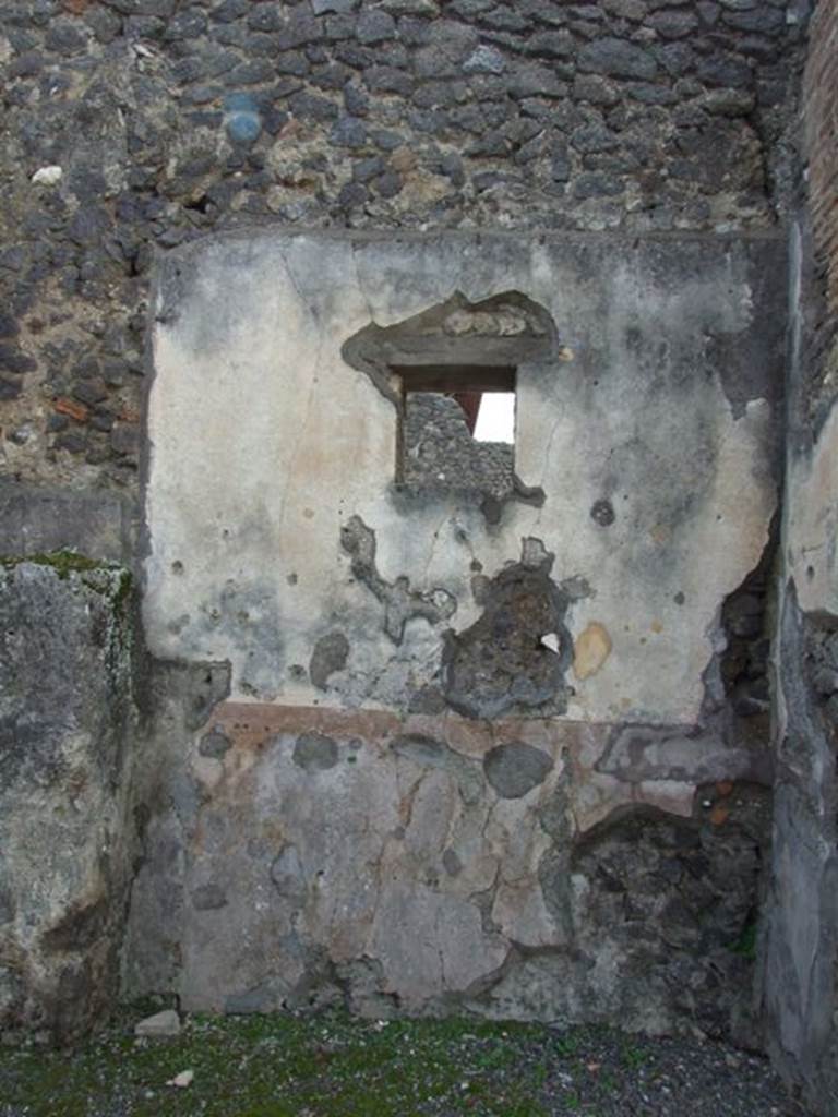 IX.8.2 Pompeii.  March 2009.  West wall of front room of shop, with window to IX.8.1.