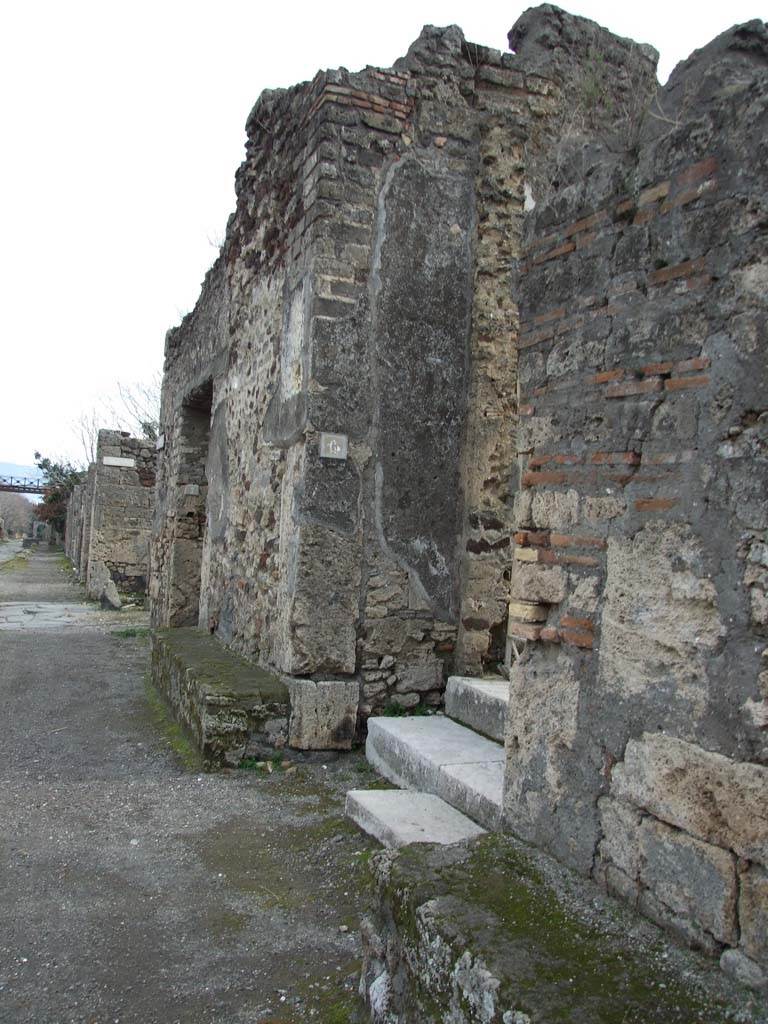 IX.8.6 Pompeii.  December 2007.  Entrance on Via Nola, looking east.
According to Della Corte, this magnificent dwelling, belonged to the Verus family.
According to the graffiti written on the façade, this was A. Rustius Verus, noted as aedile and duumvir candidate.
Another mentioned was Ti. Claudius Verus, who held the position of supreme magistrate for the year 61-62.
Much graffiti was found on the façade, especially between IX.8.6 and 7, for this see IX.8.7.
See Della Corte, M., 1965. Case ed Abitanti di Pompei. Napoli: Fausto Fiorentino. (p.133).
