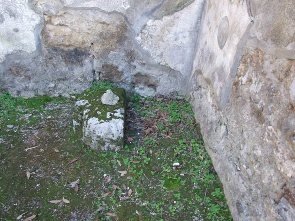 IX.8.7 Pompeii. March 2009.  Remains of base of stairs to upper floor, against south wall.