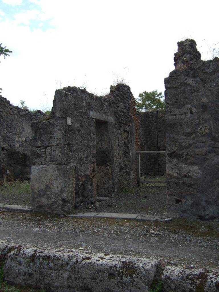 IX.9.6 Pompeii. May 2006. Looking south along east wall of entrance corridor. 
