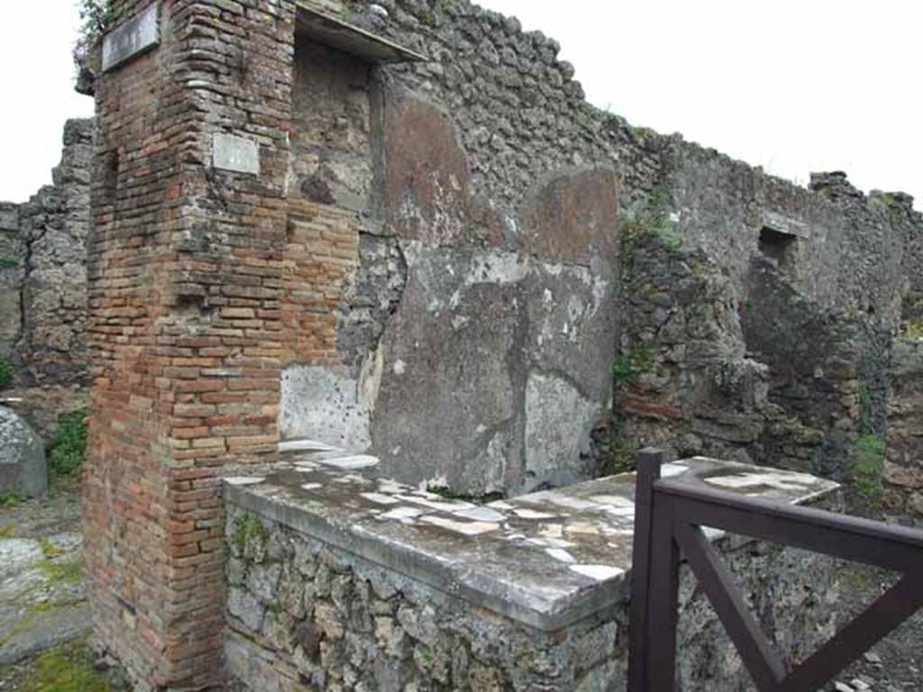 IX.9.8 Pompeii. May 2010. Looking south-east from Via di Nola towards the counter.  According to Cooleys translation, CIL IV 3775 was found here, although she gives the location as IX.VII.8. According to the note in Jashemski, this address is given as IX.VII.8,  in Mau, RM (1889), p.30 and pl.1.  However Della Corte describes CIL IV 3775 as coming from the house opposite the entrance of the house of Aemilius Celer, which would be IX.8.8.  Neighbours beg you to elect Lucius Statius Receptus duumvir with judicial power, a worthy man. Aemilius Celer wrote this, a neighbour. You jealous one who destroys this, may you fall ill.
See Cooley, A. and M.G.L., 2004. Pompeii : A Sourcebook. London : Routledge. (p.126)
See Jashemski, W. F., 1993. The Gardens of Pompeii, Volume II: Appendices. New York: Caratzas. (p.247)
See Della Corte, M., 1965.  Case ed Abitanti di Pompei. Napoli: Fausto Fiorentino. (p.166)

