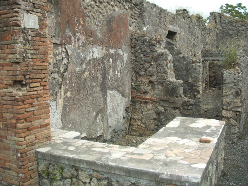 IX.9.8 Pompeii. May 2005. Bar and counter, looking south-east.