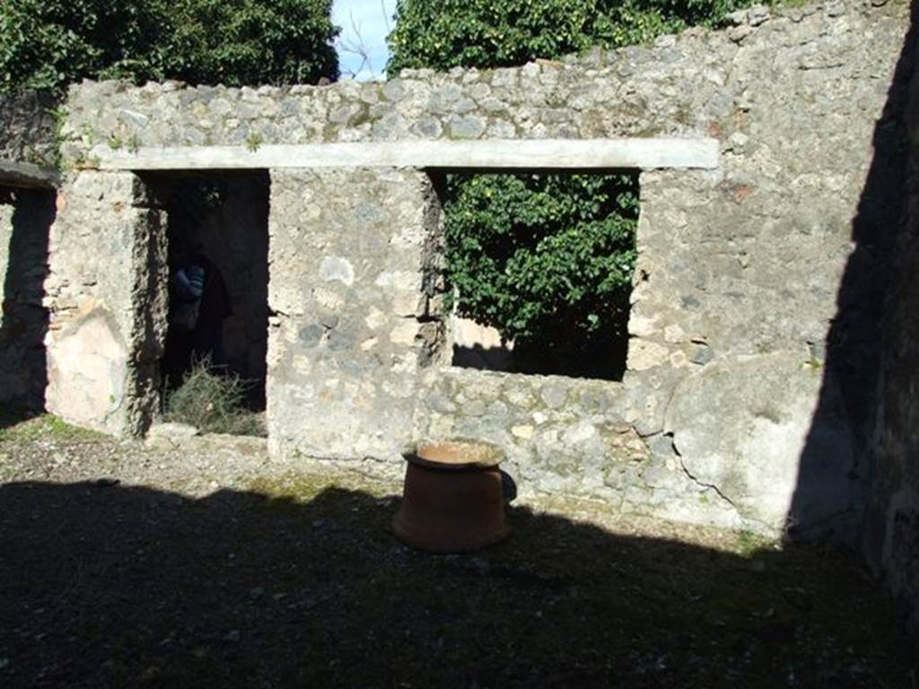 IX.9.11 Pompeii.  March 2009. Garden area.  East wall with doorway to atrium and window to Tablinum,