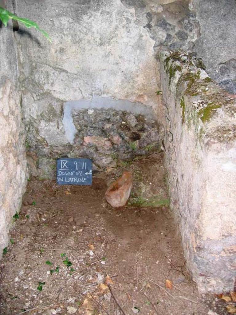 IX.9.11 Pompeii. July 2008. Downpipe in latrine. Photo courtesy of Barry Hobson