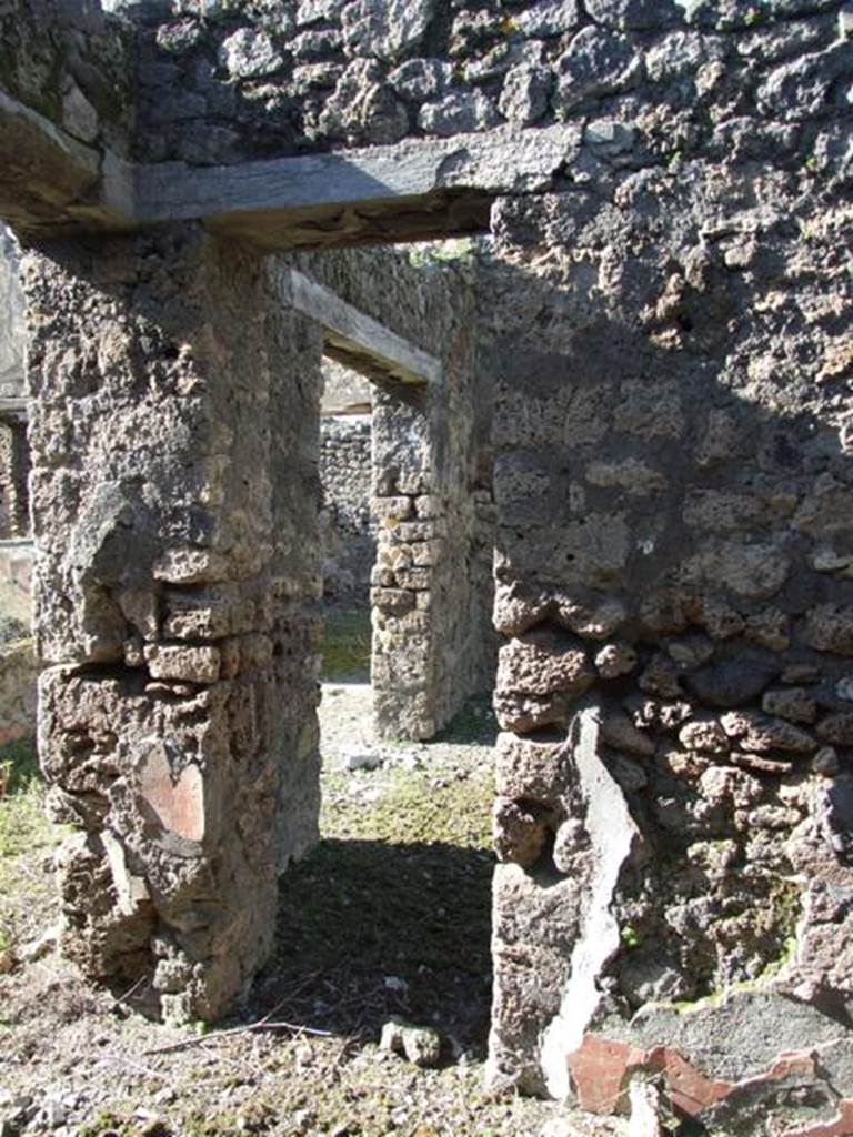 IX.9.13 Pompeii.  March 2009.  Doorway from entrance passageway into  Room 3, Triclinium.