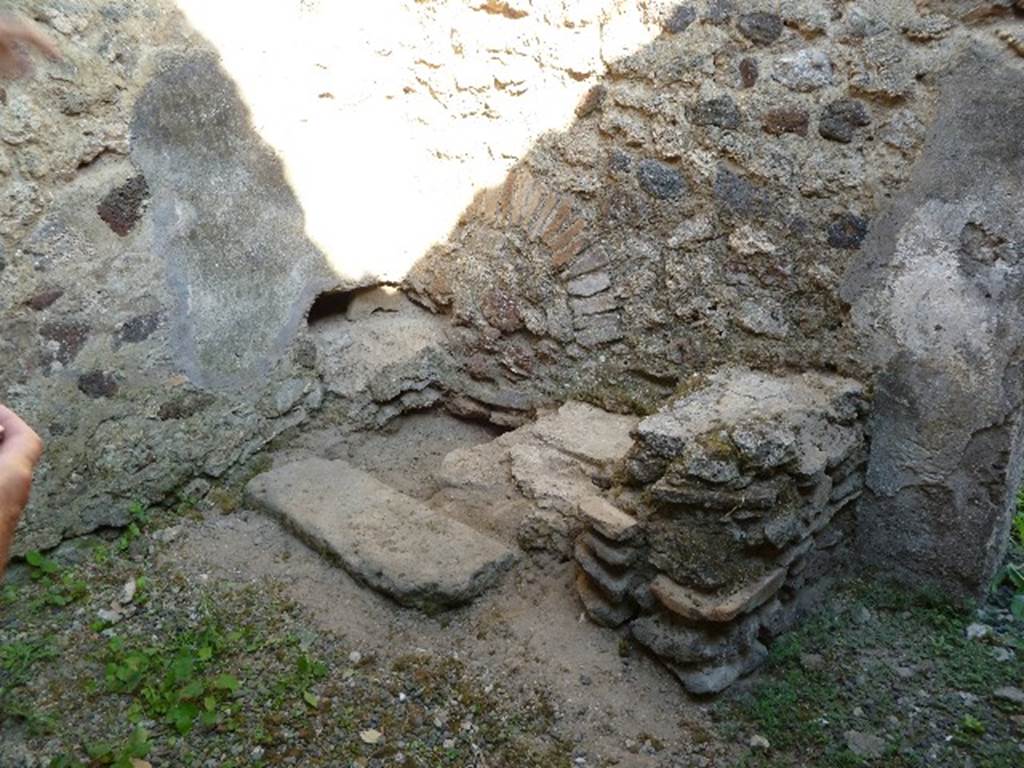 IX.9.a Pompeii. July 2010. Latrine in north-west corner of kitchen. Photo courtesy of Michael Binns.