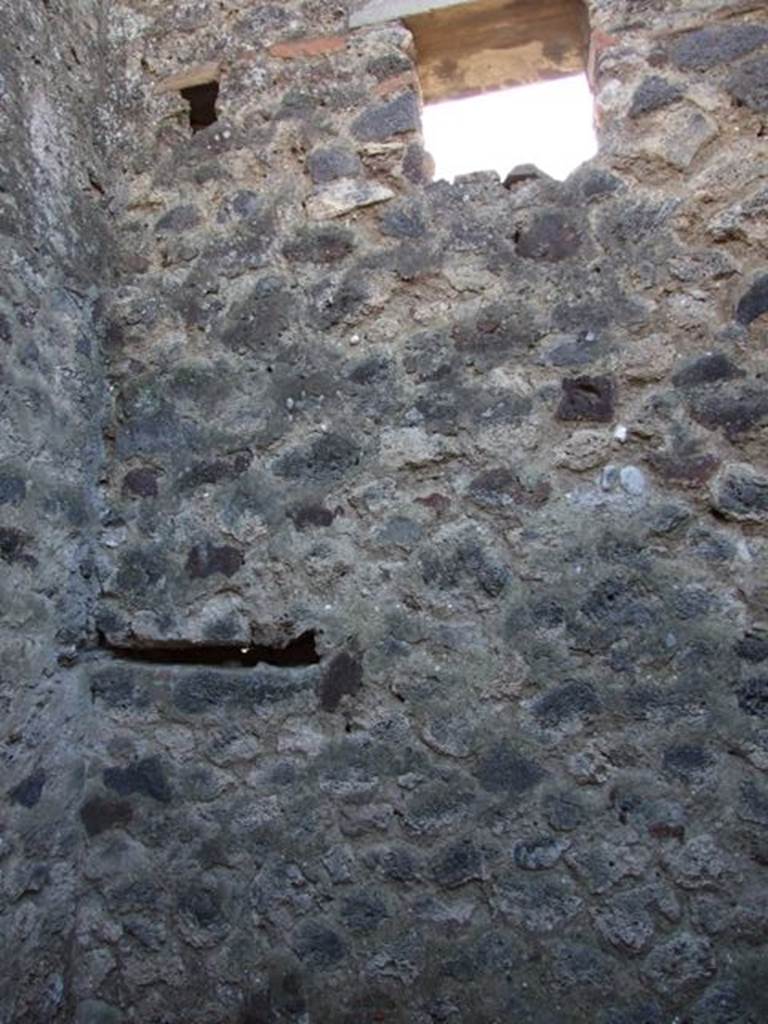 IX.9.a Pompeii. March 2009. West wall with window, in kitchen and latrine.