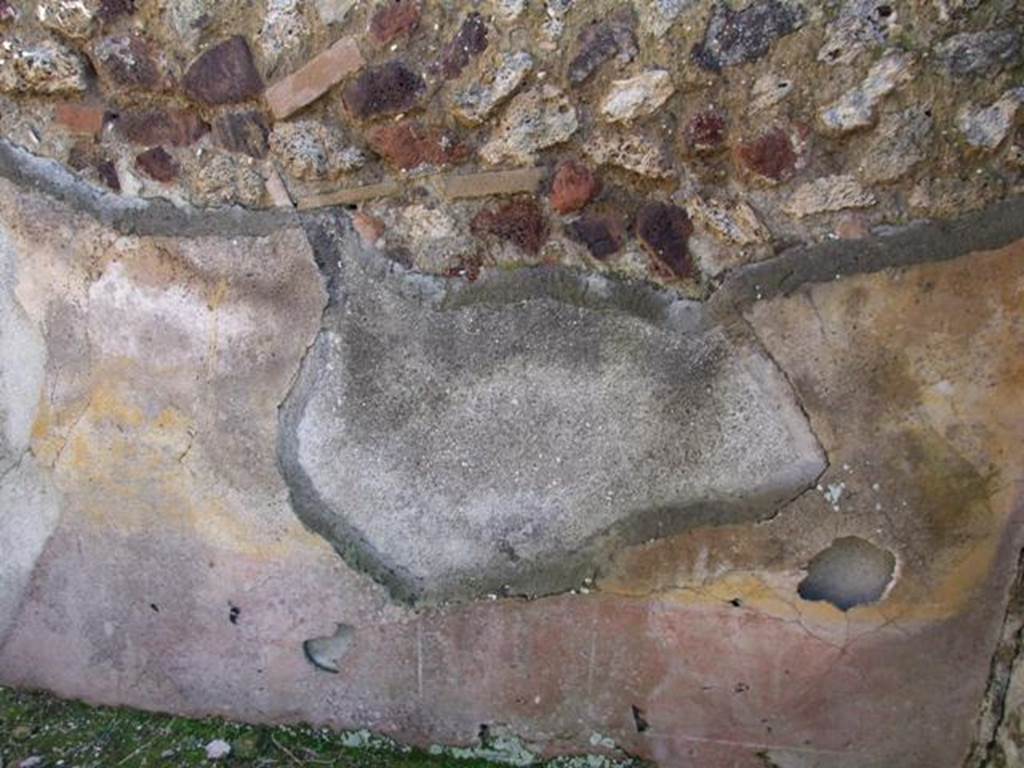 IX.9.a Pompeii. March 2009. South wall of cubiculum. This bedroom was described as having flooring of crushed brick (mattone pesto) with pieces of coloured marble of various forms and sizes added to it. The walls were plastered, with a yellow background in the middle part, with a white frieze and red plinth or dado. In the middle of the yellow panels were rather crudely painted doves. See Notizie degli Scavi, 1888, p.515.
