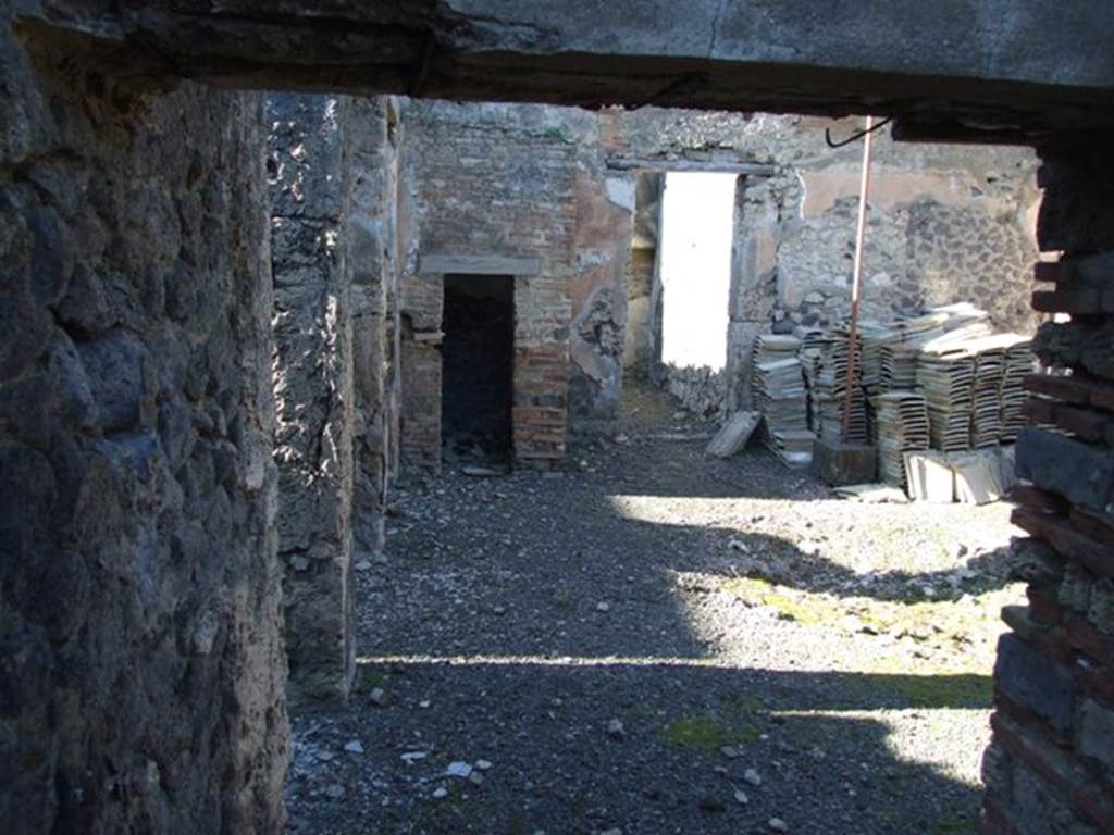 IX.9.d Pompeii. March 2009. Looking north across west side of atrium b, from doorway of room h.