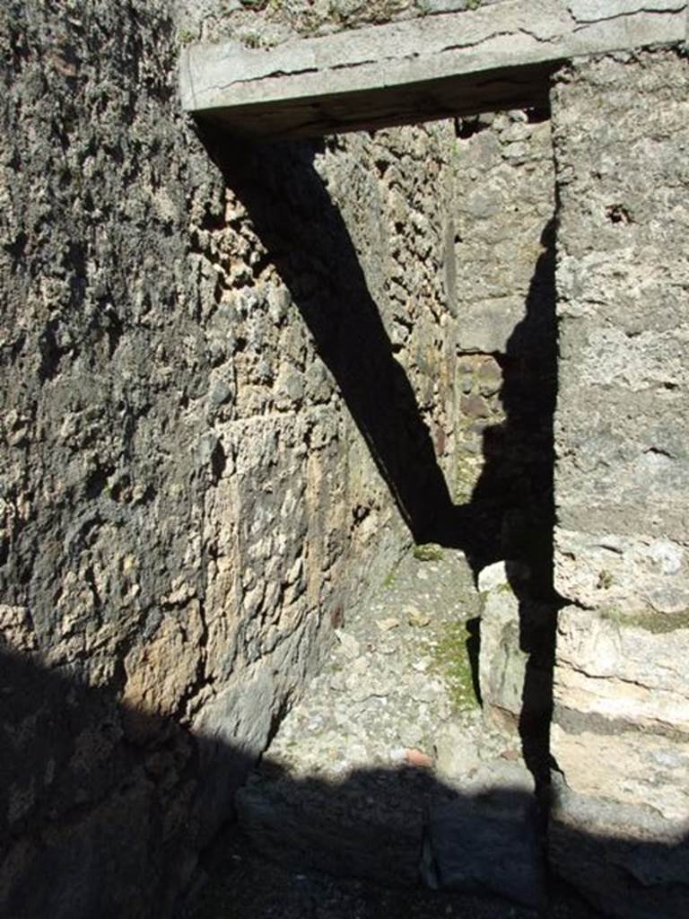 IX.9.f Pompeii.  March 2009.  Doorway to Staircase to upper floor, with Latrine underneath.