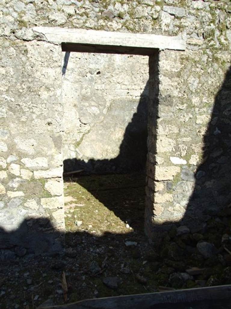 IX.9.f Pompeii.  March 2009. Doorway to Tablinum (or Triclinium?) in south east corner of atrium.