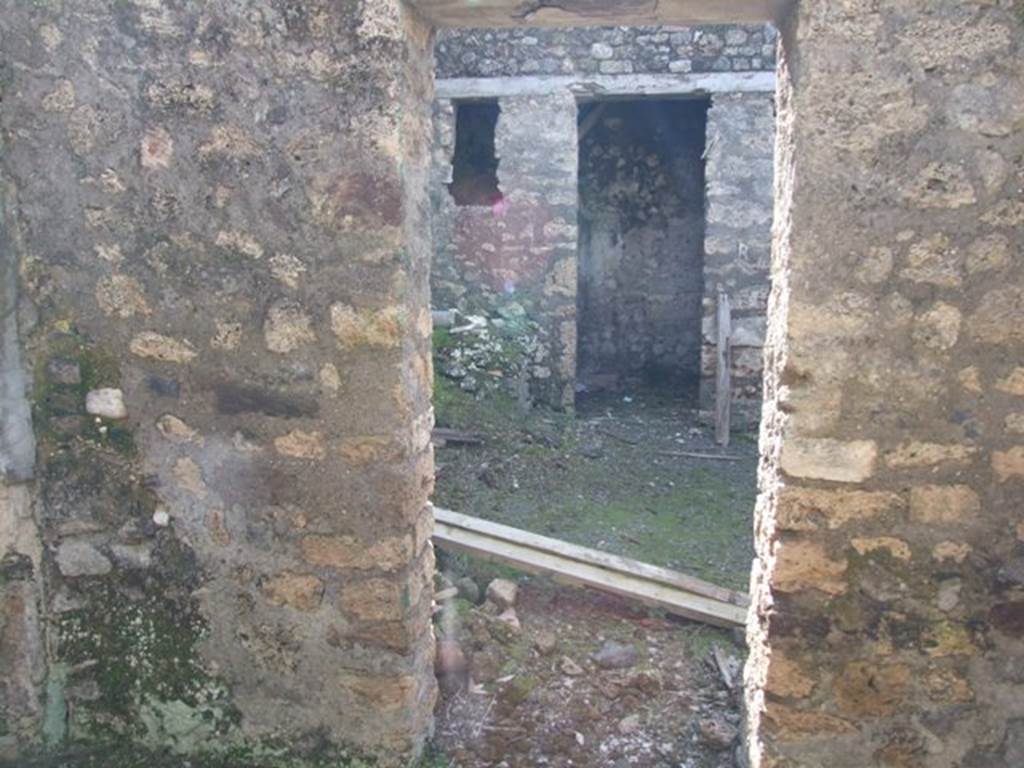 IX.9.f Pompeii. March 2009. West wall of tablinum (or triclinium?) with doorway to atrium.