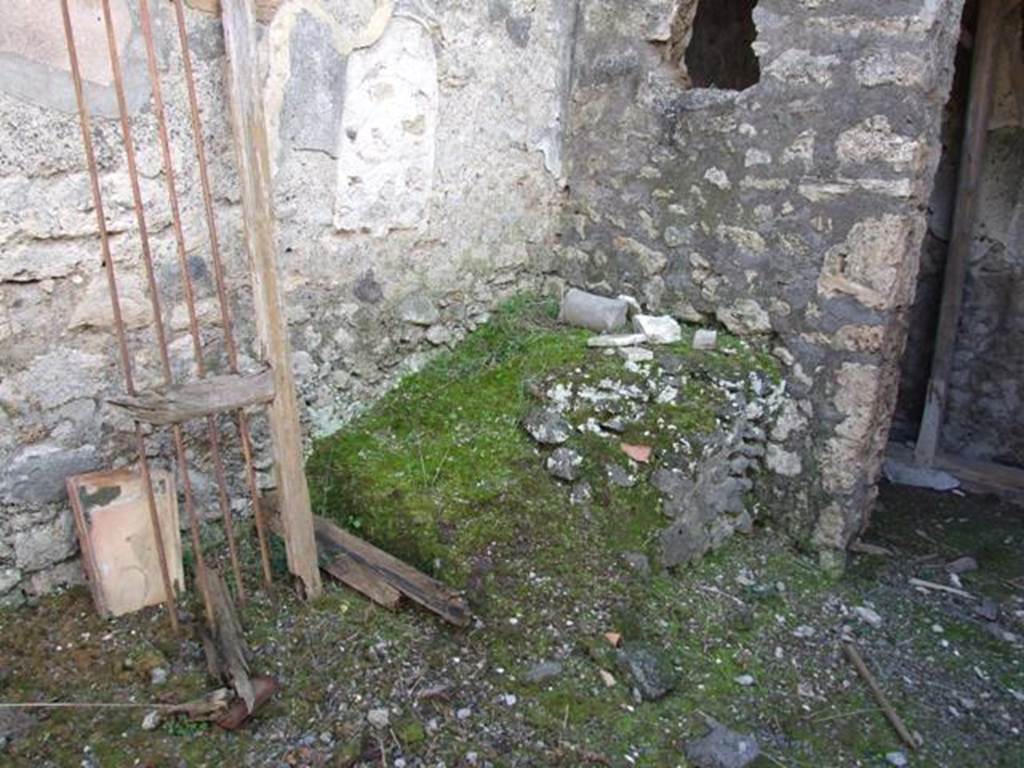 IX.9.f Pompeii. March 2009. Remains of masonry staircase base in south-west corner of atrium.