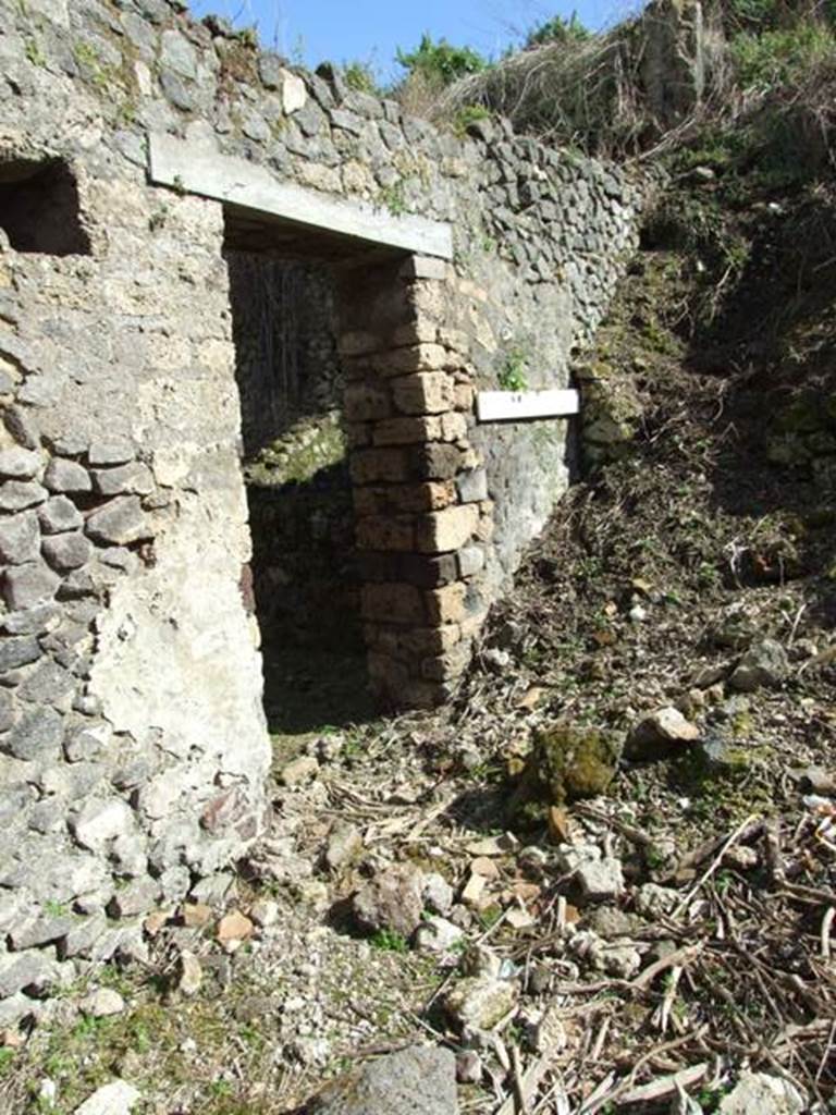 IX.9.g Pompeii. March 2009. Entrance doorway. According to Della Corte, the name of the owner was found painted and written many times at the side of the entrance, as well as in the vicolo.
See Della Corte, M., 1965.  Case ed Abitanti di Pompei. Napoli: Fausto Fiorentino. (p.166)
Found painted were 
Aemilius Celer hic habitat     [CIL IV 3794]  
P. Aemilius Celer     [CIL IV 3790]  
Aemilius Celer          [CIL IV 3792]
According to Epigraphik-Datenbank Clauss/Slaby (See www.manfredclauss.de) these read -
Ae[mili]us Celer hic habitat      [CIL IV 3794]
P(ublius) Aemilius Celer           [CIL IV 3790]
Aemilius Celer                             [CIL IV 3792]
Graffitoed were 
Celer           [CIL IV 5288, and 5289 a e b ]
P. Aemiliu(s)                      [g]
Celer amicu(s)                             [CIL IV 5291, h,i,k,j]  
Ce(ler), Celer, Ce(ler), Ce(ler)   [CIL IV 5994, a-d]
According to Epigraphik-Datenbank Clauss/Slaby (See www.manfredclauss.de), they read -
Celer            [CIL IV 5288]
Celer / Celer       [CIL IV 5289]
P(ublicus) Aemilius / M() / Il / iu amicu      [CIL IV 5291]
Chl                [CIL IV 5994]

