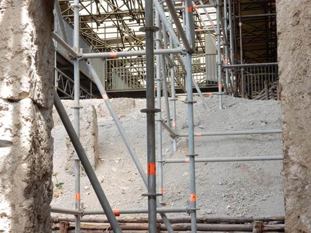 IX.12.1 Pompeii, May 2018. 
Looking north through doorway to rear room “c”, towards pumice from entrance doorway. Photo courtesy of Buzz Ferebee.

